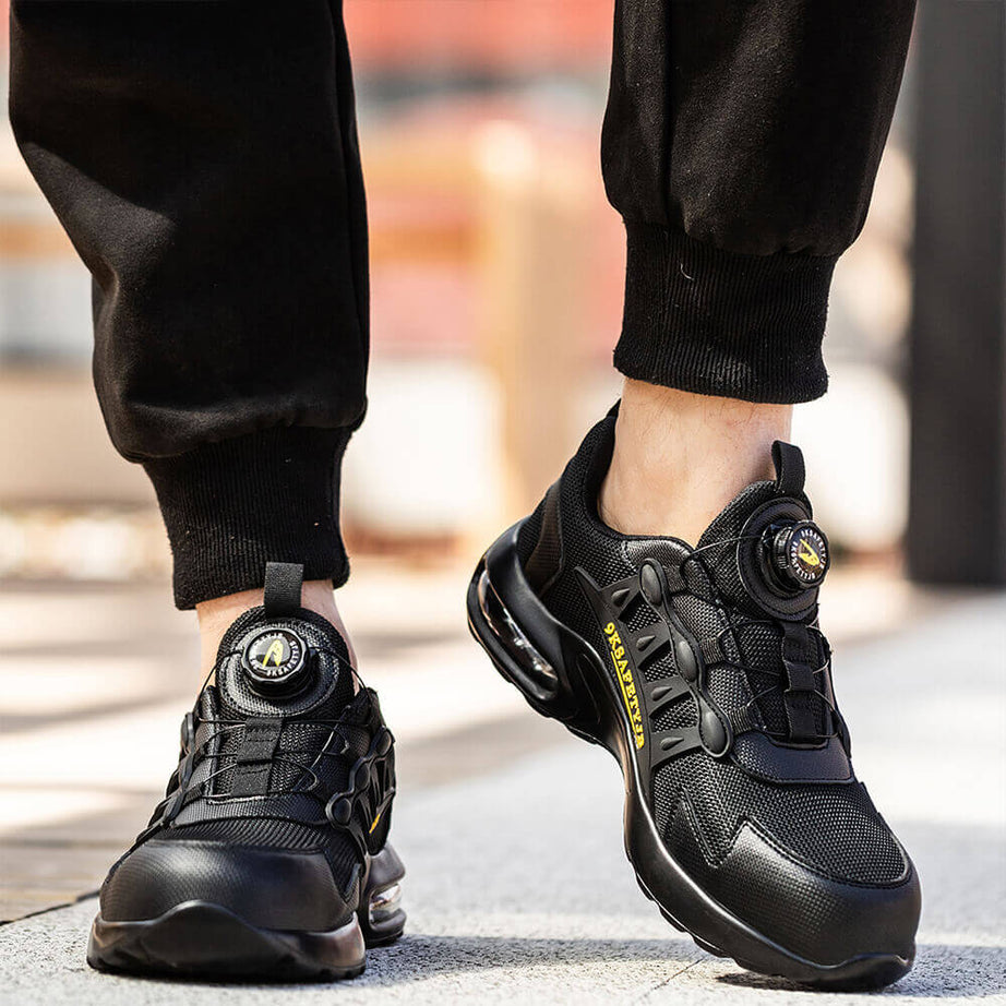 Black swivel Buttons work shoes for men, Front view of shoes 